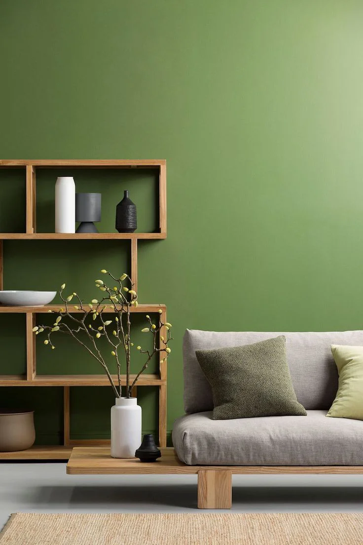 Wall Painting | Green painted wall with beautiful sofa in a room