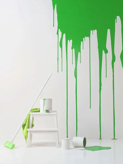 Wall Painting | Green paint on a wall with brush and painting boxes